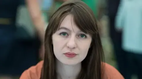 Irish author Sally Rooney declares she will not visit the UK due to legal concerns